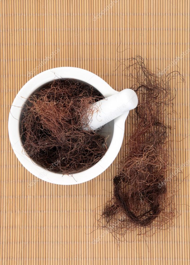 Кукурузные рыльца и белая ступка