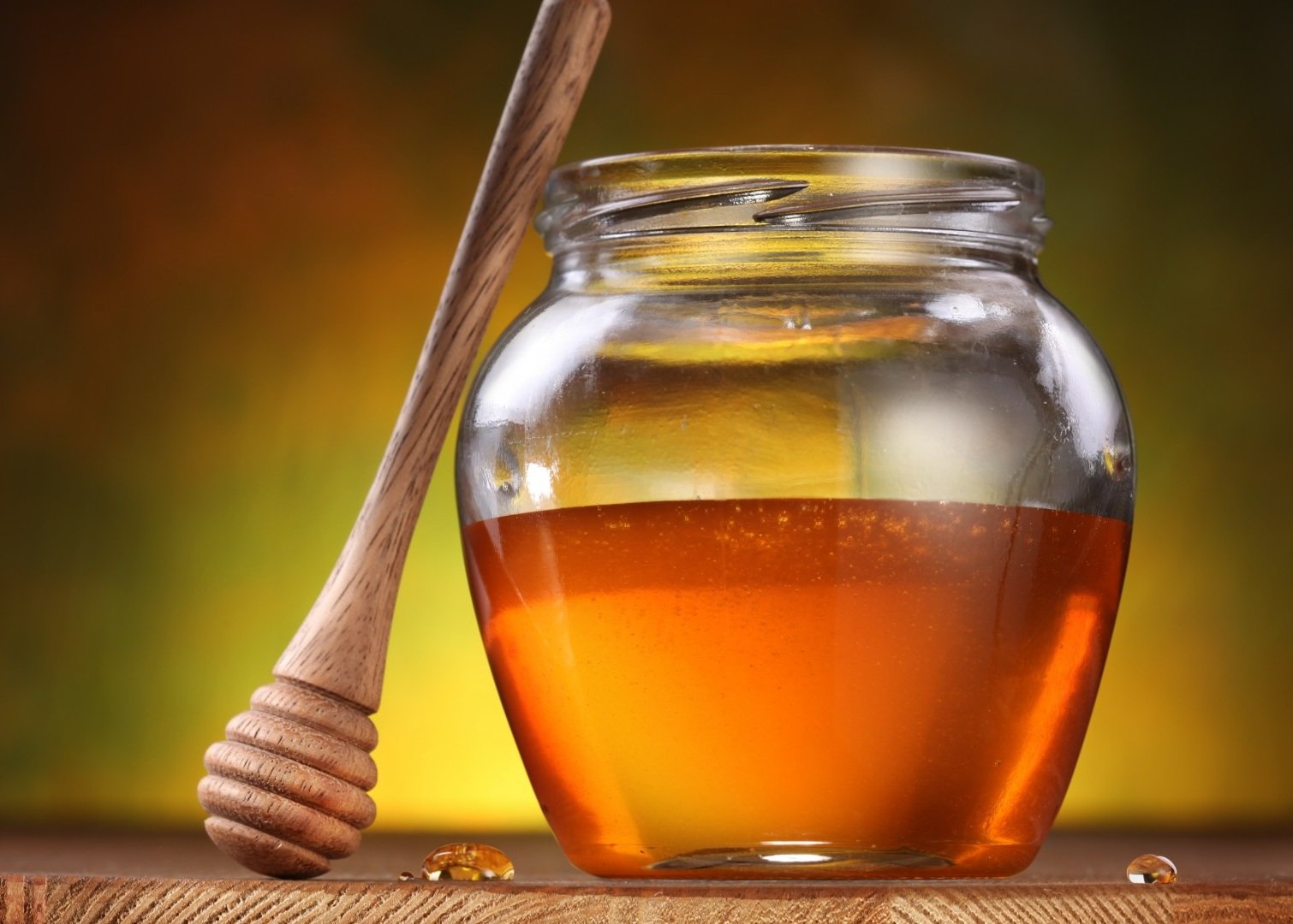 Мёд в банке и ложка-веретено